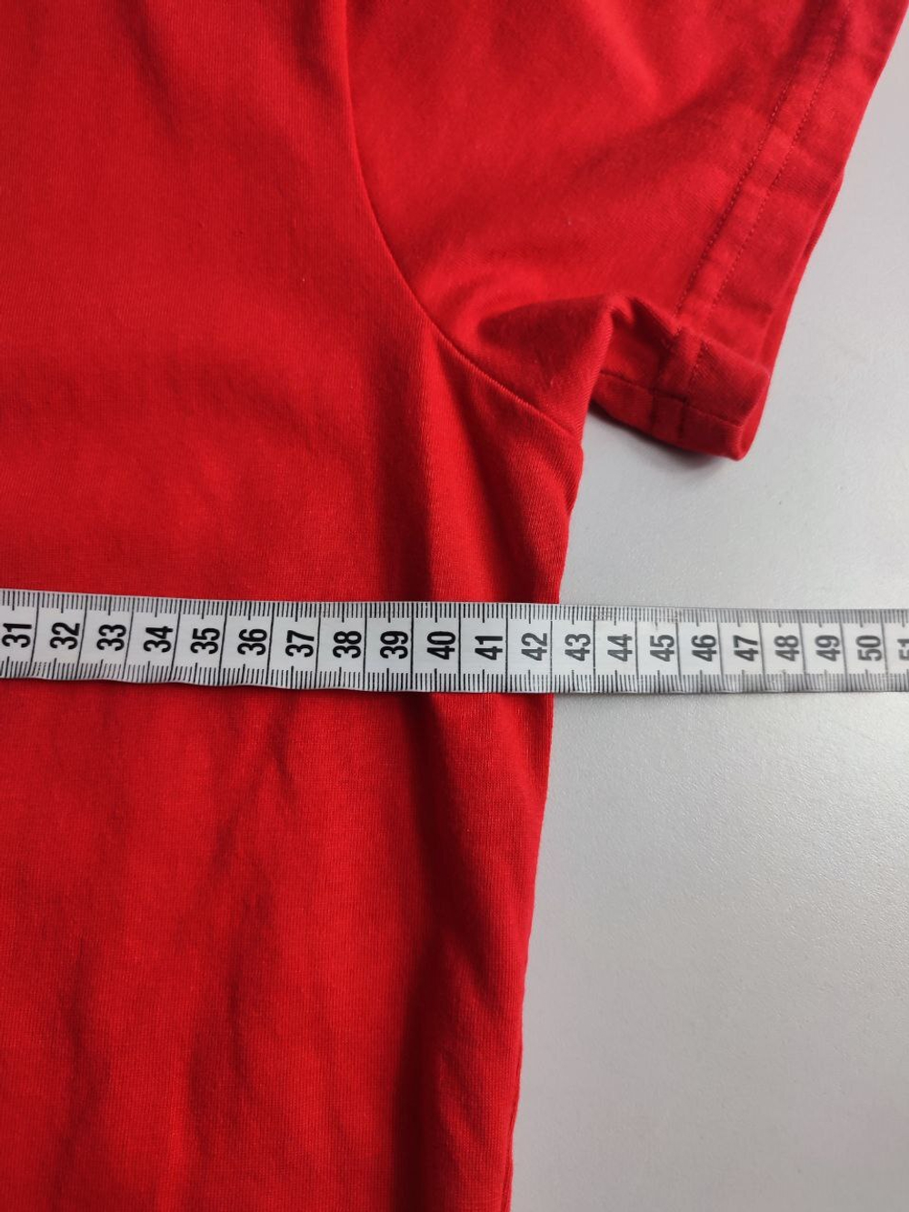 Футболка-поло Castore яркая 42 размер