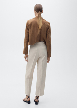 Льняные брюки с защипами