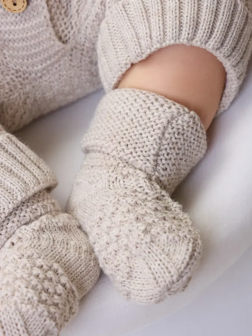 вязаный комбинезон для новорожденных