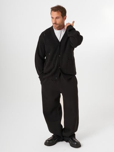 Черный кардиган с разрывами QWE