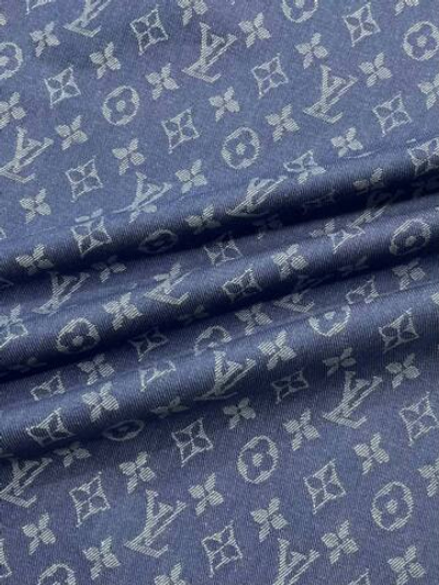 Джинса (деним) хлопковая Louis Vuitton синяя с голубым лого