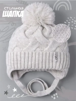 Шапка для девочки на завязках на осень