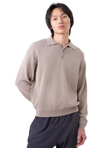 Бежевый джемпер-поло Senseera