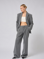 Брюки широкие с защипами в полоску