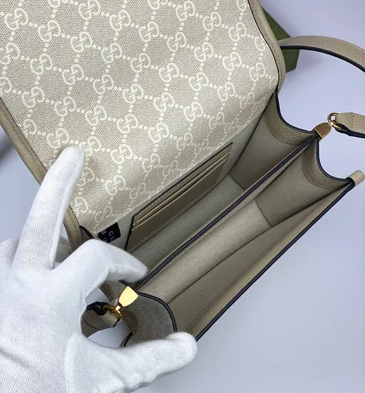 Миниатюрная сумка через плечо Gucci Interlocking G