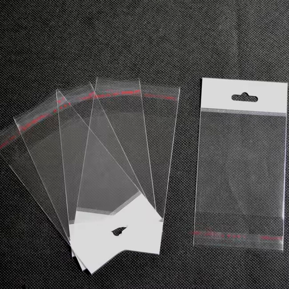 Пакеты 4х4+6 см с белым европодвесом и клеевым клапаном