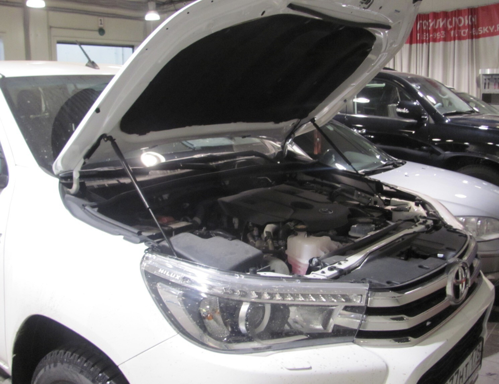 Амортизатор (упор) капота на Toyota Hilux UP 3051(с 2015 г.в.)Atlant