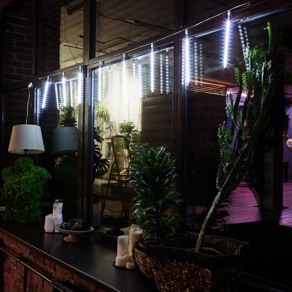 ULD-E2403-144-DTK WHITE IP44 METEOR Занавес светодиодный фигурный Падающие звезды. соединяемый. 2х0.3м. 8 подвесов. Белый свет. Провод прозрачный. TM Uniel.