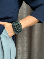 Браслет "Венеция" из венец.стекла бисерной огранки на кожан.застежке,оттенок сине-зеленый