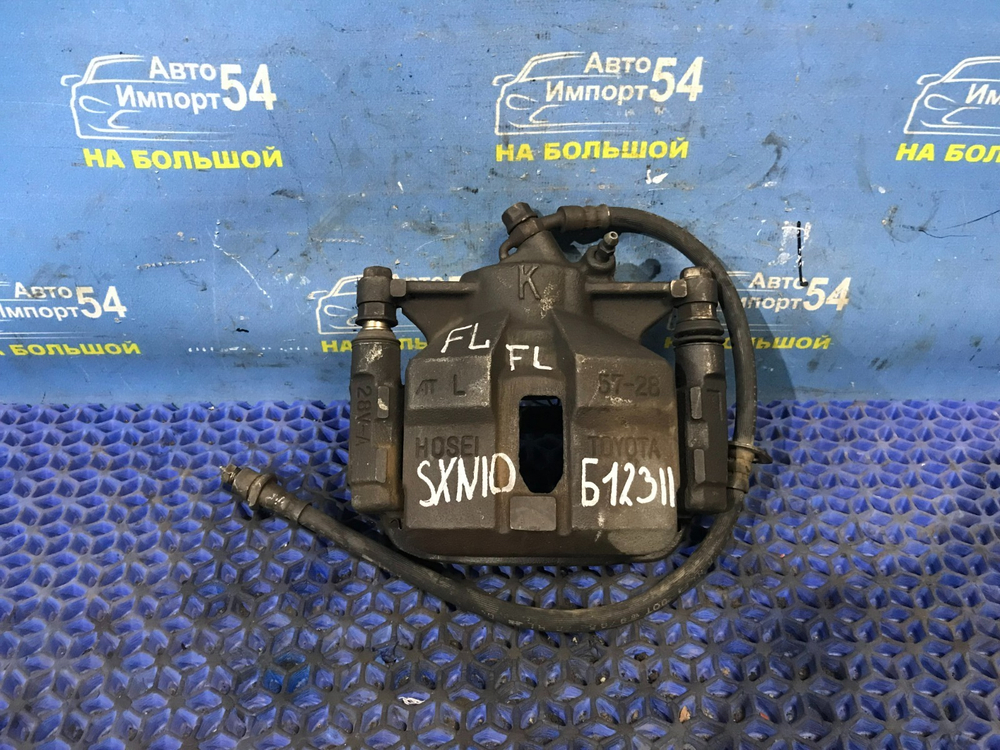 Суппорт тормозной передний левый TOYOTA IPSUM 1996-2001