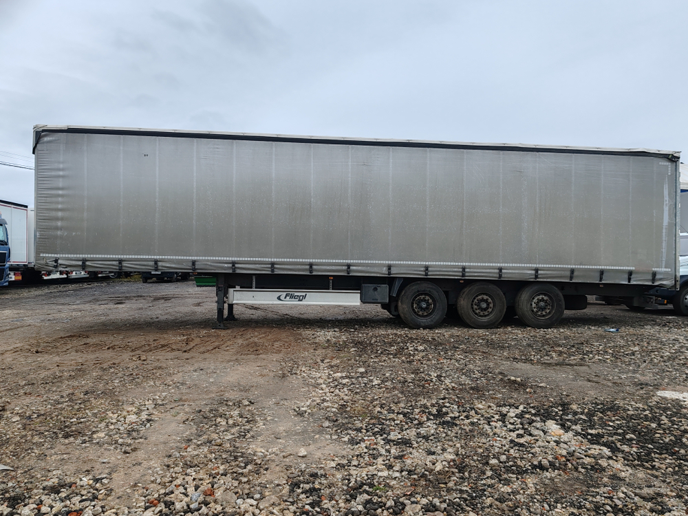 Fliegl SDS 350 Полуприцеп шторный для перевозки опасных грузов SDS 350