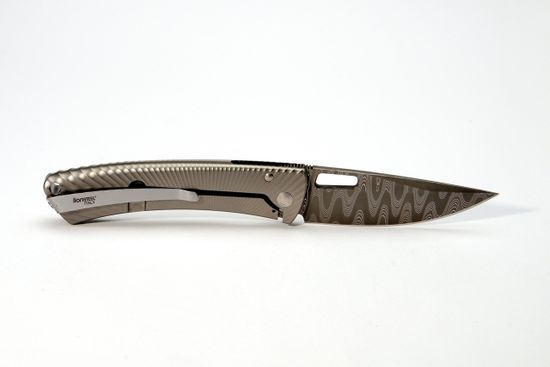 Складной нож Lion Steel "TISPINE" L/TS-1DF GM c клинком из стали Damasteel, рукоять титан