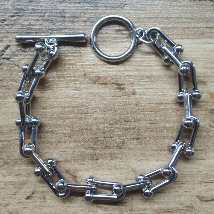 Браслет-тоггл "Цепи" плетение якорное узелки металл серебристый