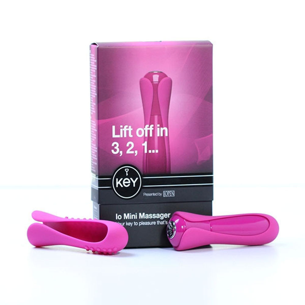 Розовый минивибромассажер с двумя сменными насадками Io Key