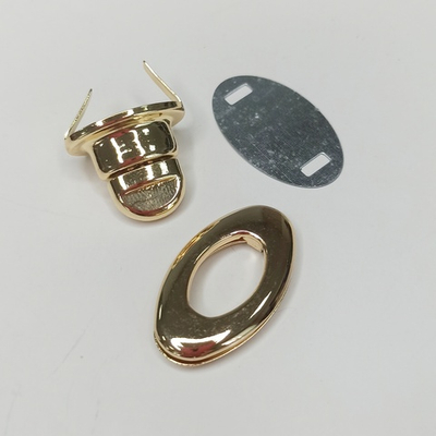 Замок вертушка на зажимах 34*20 Золото