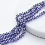 Фианит (кубический цирконий), цвет фиолетовый, размер 4 мм, цена за отрезок 19 см (1/2 нити)