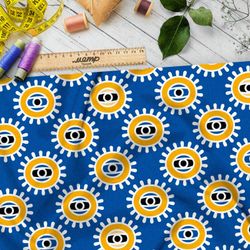 Ткань поплин солнечные глаза на голубом фоне