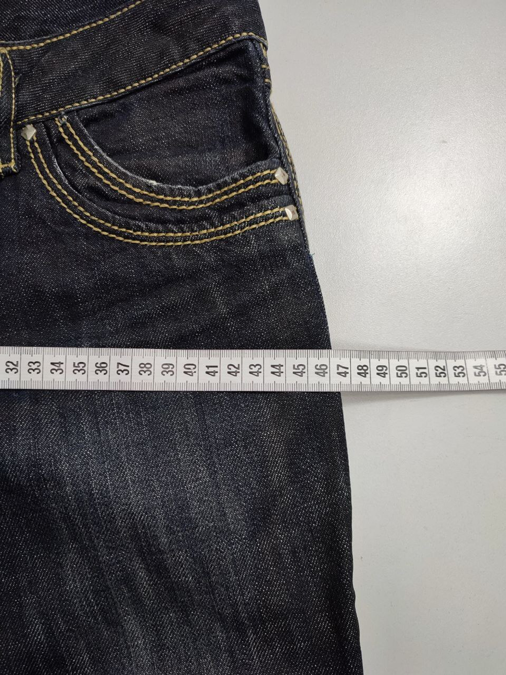 Джинсы темные 44 размер