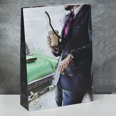 Пакет бумажный 32*45*10см с ручками микс XL585-589