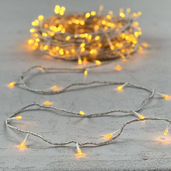 Светодиодная гирлянда с возможностью динамики 20 м., 200 желтых LED ламп, 24V., прозрачный силиконовый провод, IP65, Beauty Led (EST200-3W10-1Y)