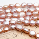 Жемчуг бусины, цвет розовый, размер около 8,8-10,2*7,3-8,2 мм, цена за 9 шт (1/4 нити)