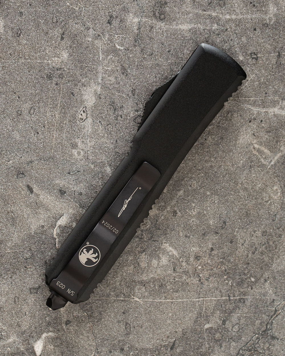 Автоматический складной нож Microtech Ultratech T/E Black Tanto 123-2T (черный-полусеррейтер) фронталка/выкидуха