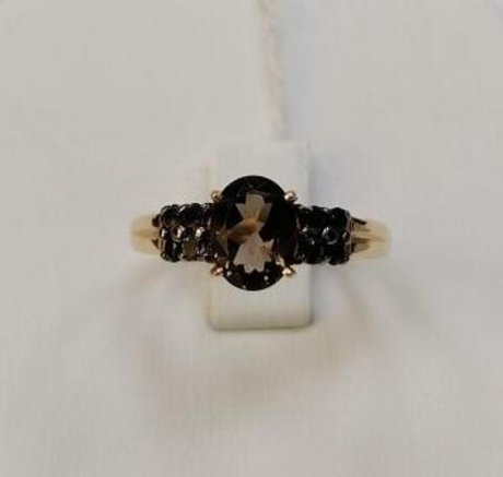 Кольцо из золота с раух-топазами
