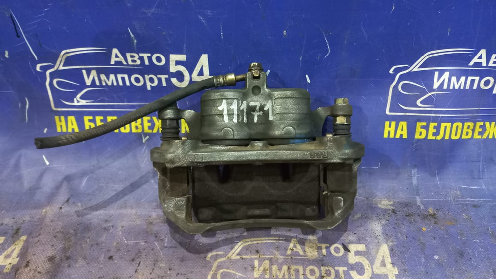 Суппорт тормозной передний левый NISSAN SERENA 2005-2010