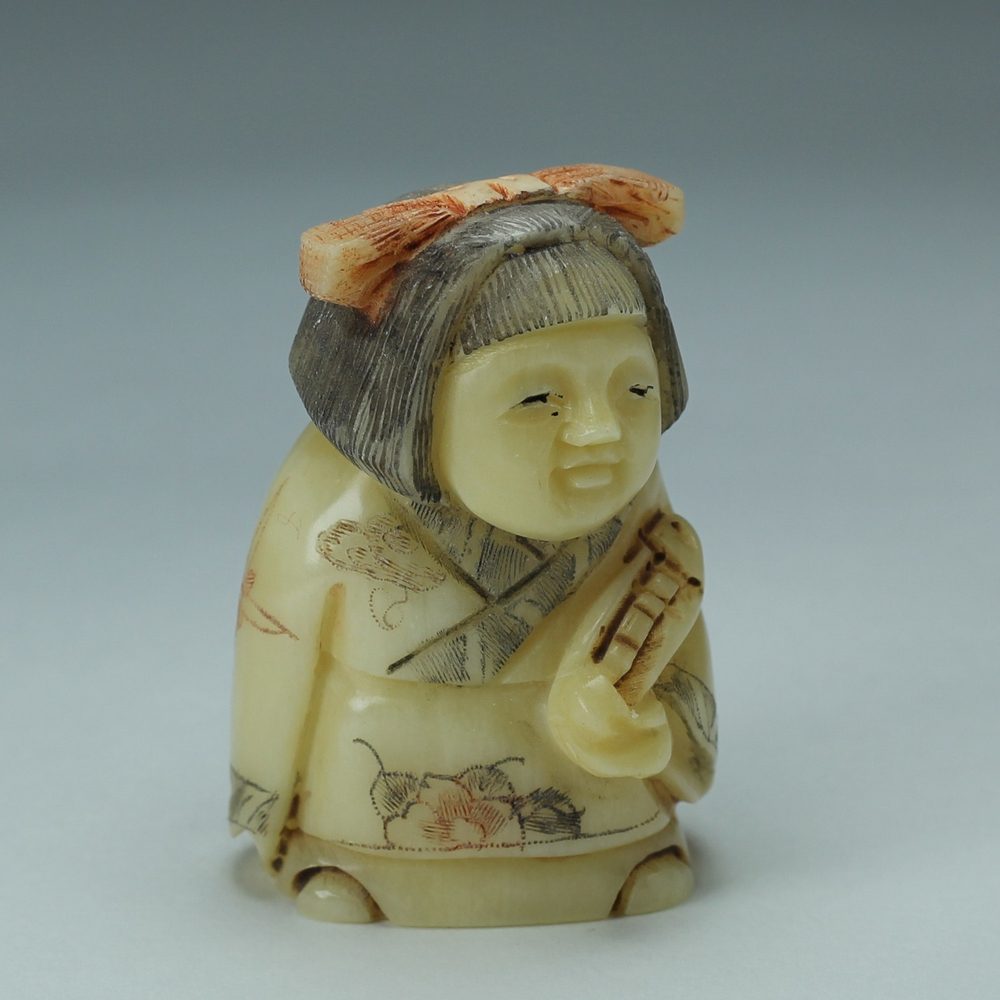 Нэцкэ Девушка с угрем