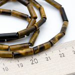 Тигровый глаз, размер около 14*4 мм, цена за 13-14 шт (1/2 нити)