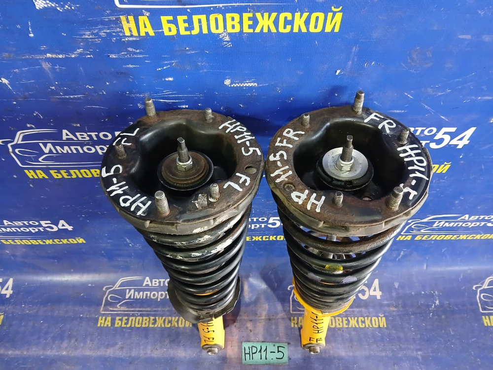 Стойка передняя левая NISSAN PRIMERA 1998
