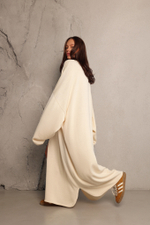 Джемпер-платье с вырезом на груди