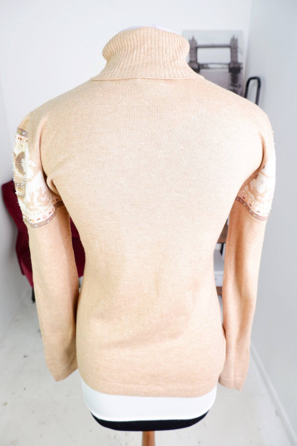 Джемпер Tesini лаконичного оттенка, визуально на 44 размер