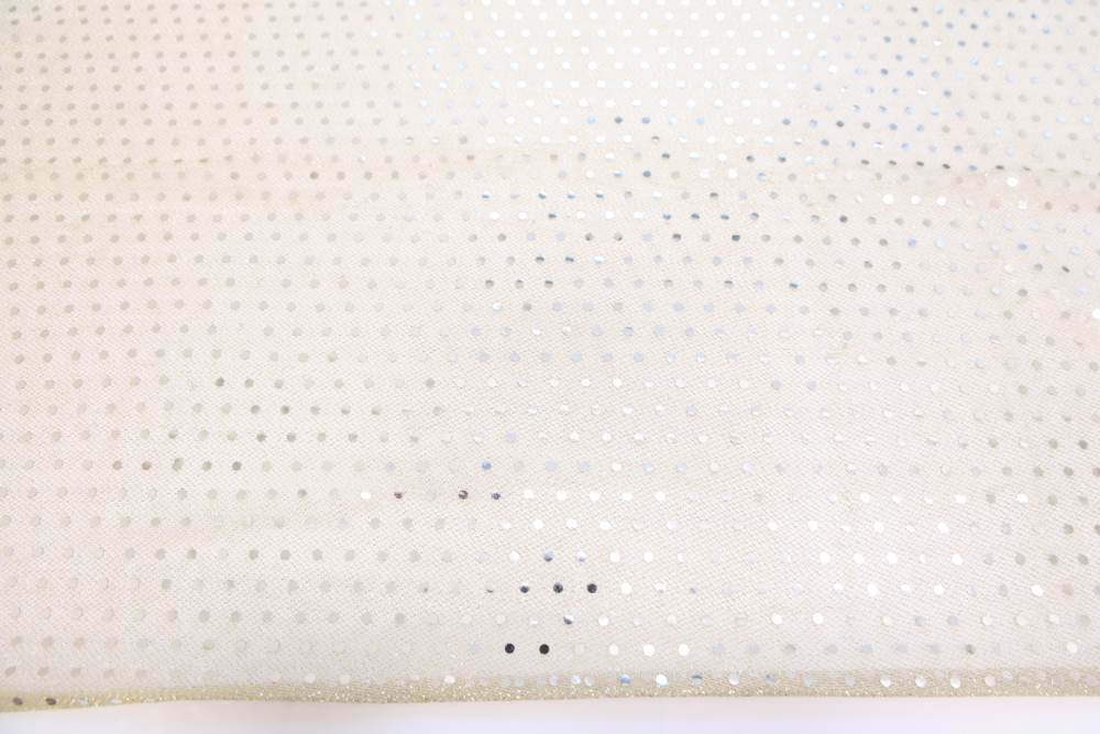Трикотаж с пайетками молочный