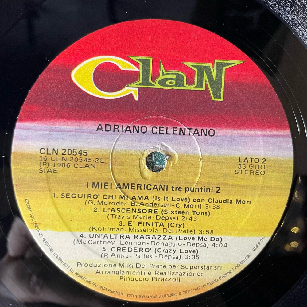 Винтажная виниловая пластинка LP Adriano Celentano Адриано Челентано, I Miei Americani (Tre Puntini) 2 (Италия 1986) Veronica Verrai