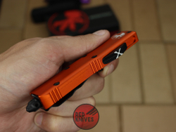 Нож Microtech UTX-85 S/E - оранжевая рукоять, стандартный клинок, сатин + запчасти RK-393