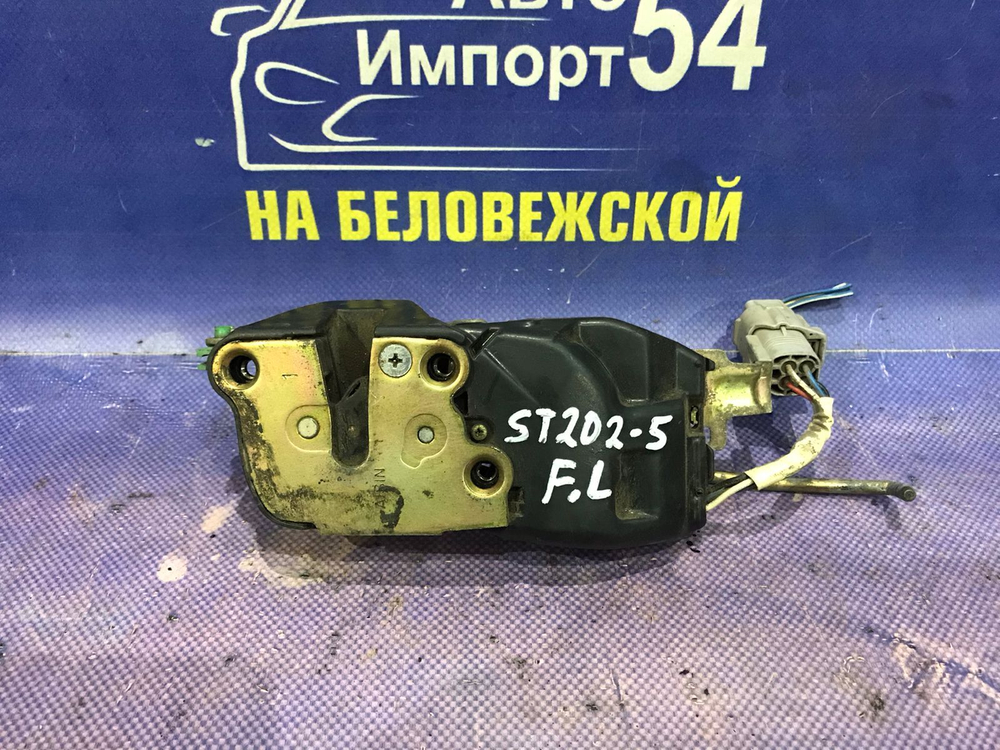 Замок двери передней левой TOYOTA CARINA ED 1994