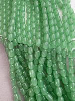 Стеклянные бусины, бочонок 6*9 мм, нить 38 см, "Хризолит"