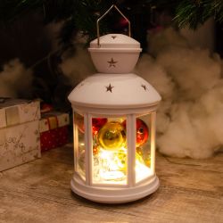 ULD-L1220-012-TTB-WW WHITE Фонарь со светодиодной гирляндой внутри. на батарейке в комплект не входит. 12 светодиодов. Теплый белый свет. Режим мерцания. Белый корпус. 12x20 см. TM Uniel.