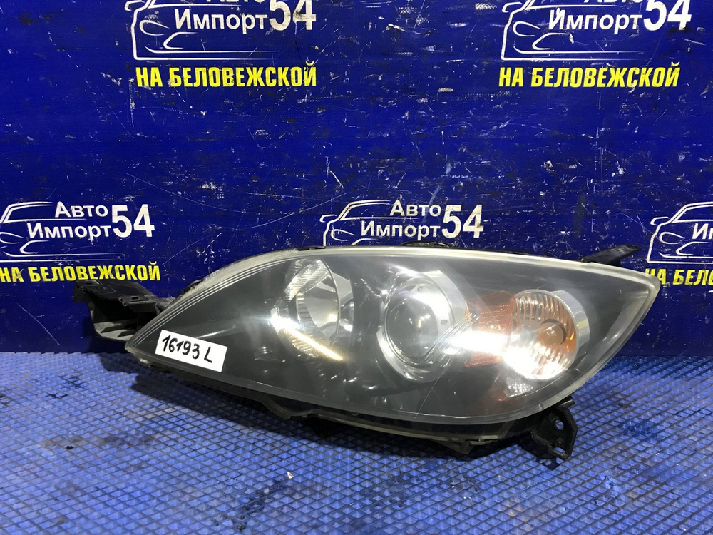 Фара передняя левая MAZDA AXELA 2003-2006