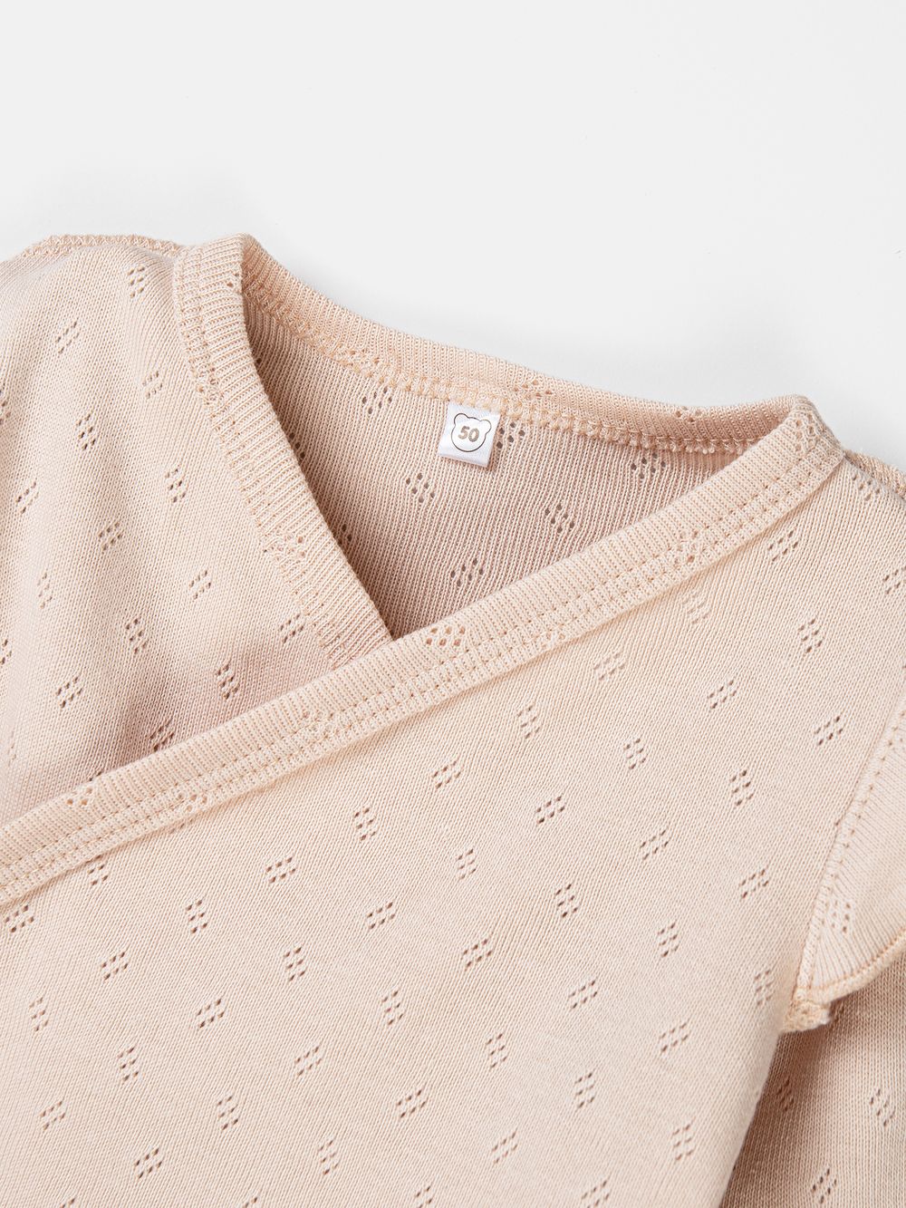 Слип на кнопках с крылышками "Нюд" из ажурного хлопка 0+