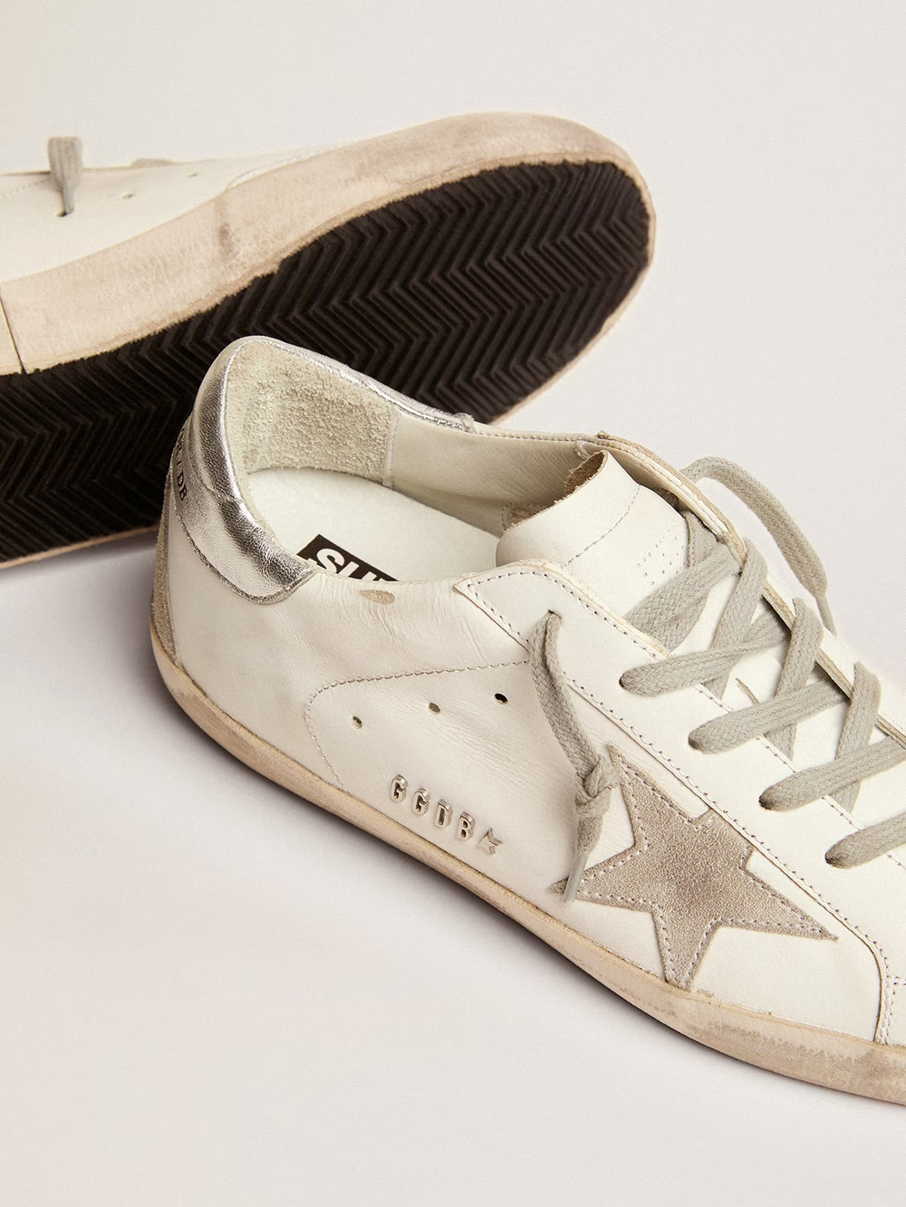 Super Star with silver heel tab and metal stud lettering