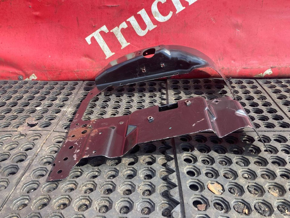 Кронштейн фары левой