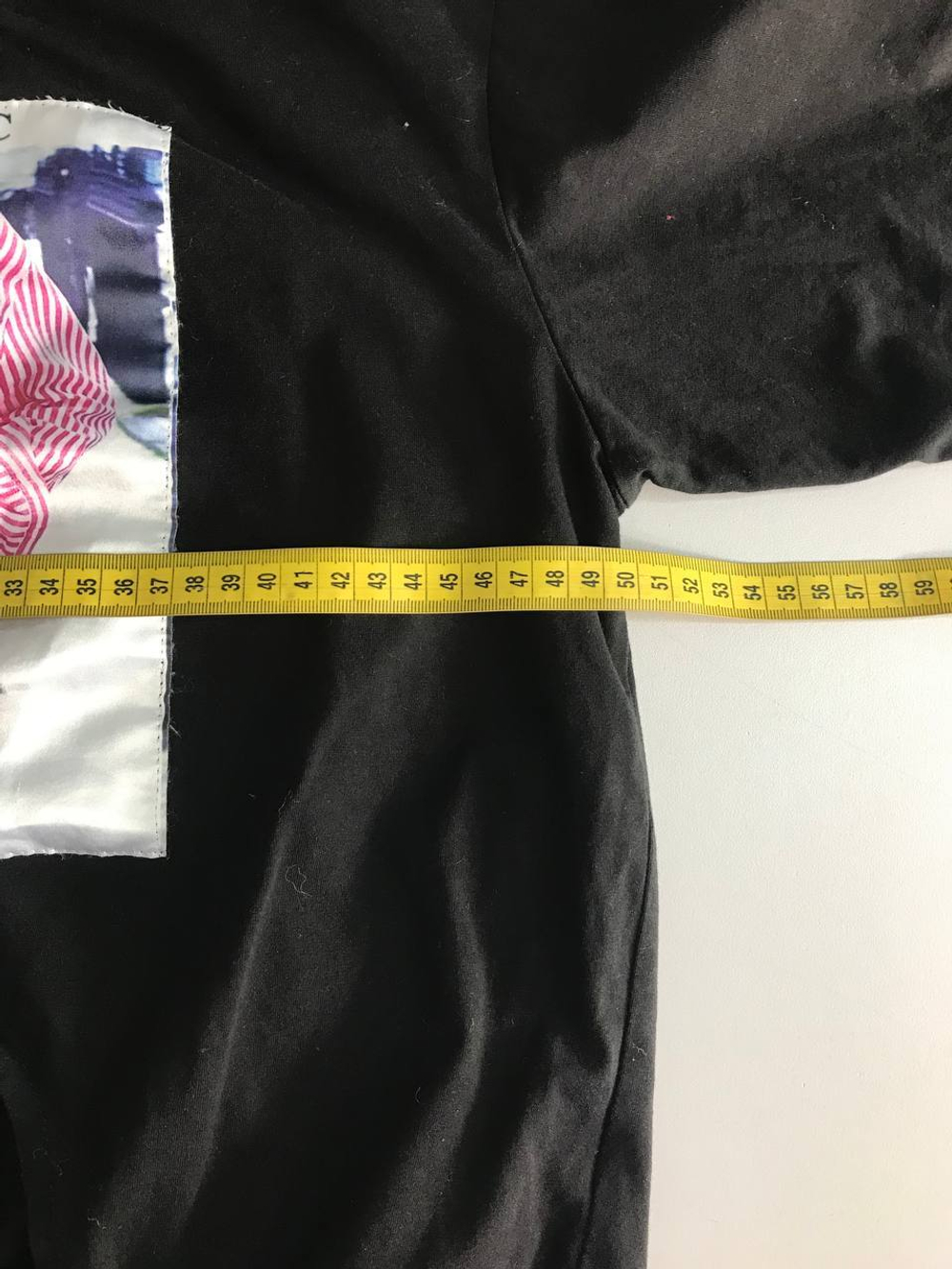 Футболка со стильным принтом, визуально на 48 размер