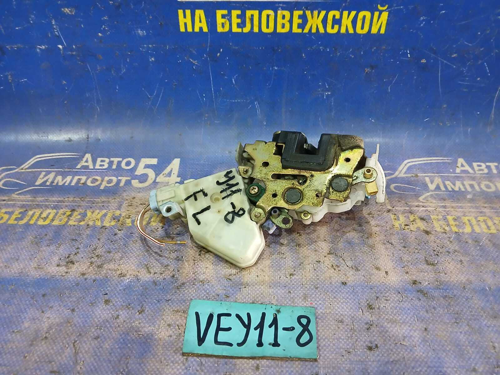 Замок двери передней левой NISSAN AD 2001