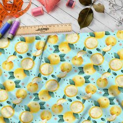 Ткань габардин мягкие лимоны на голубом фоне