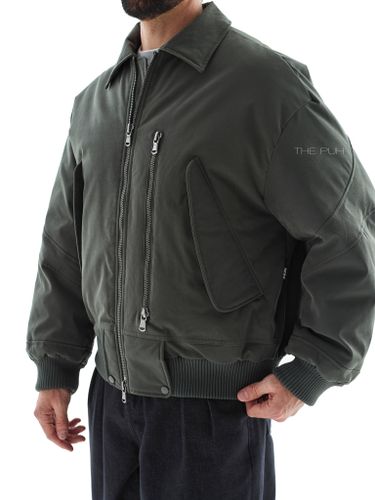 Утепленный зеленый бомбер с отложным воротником