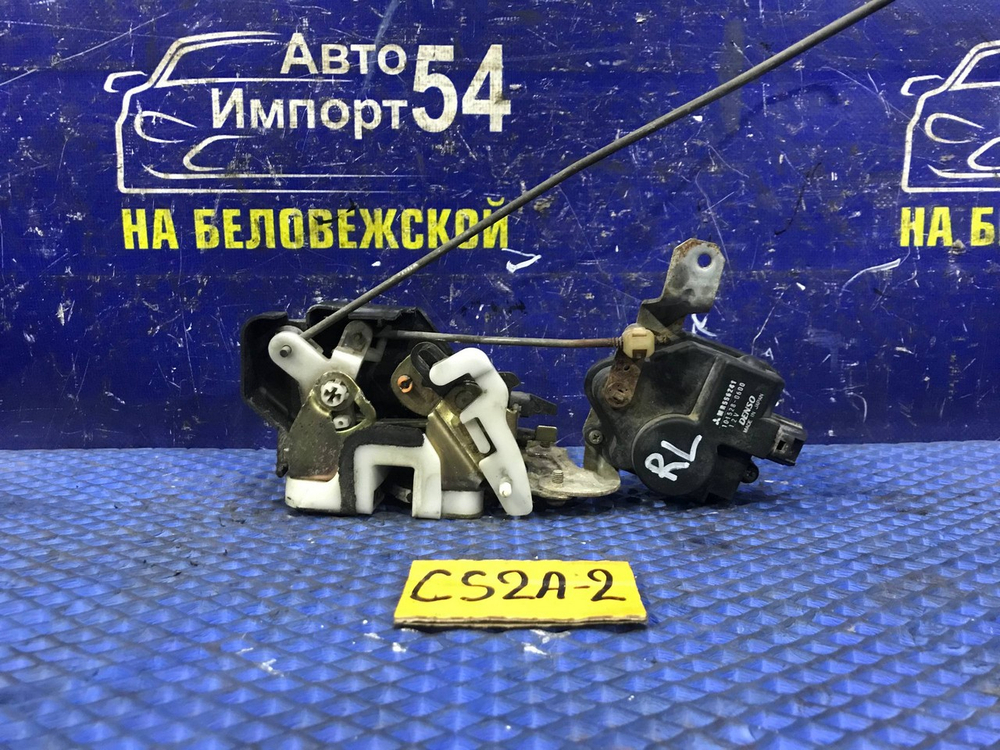 Замок двери задней левой MITSUBISHI LANCER 2002