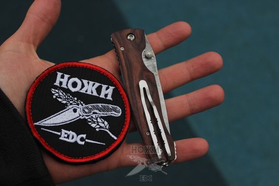 Складной нож Mcusta Damascus Elit Tactility MC-0122DR c клинком из стали VG-10 San Mai (Laminated Stainlesss Damascus) рукоять дерево