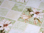 Клеенка столовая DEKORAMA 140см*20м "Лилии в зеленой клетке"